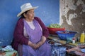 Unidentified indigenous native Quechua woman with traditional tribal clothing and hat, at the Tarabuco Sunday Market, Bolivia Royalty Free Stock Photo